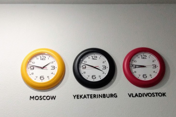 Three clocks showing different time zones in Russia