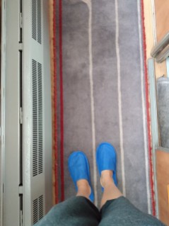 Tors feet in train slippers on the Trans Mongolian